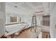 Spacious living room under construction with large windows overlooking the yard at 4267 Matisse Ln, Fairburn, GA 30213