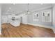 Living room area with great lighting and a view into the kitchen area at 4267 Matisse Ln, Fairburn, GA 30213