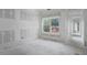 Partially finished room with a window, showcasing the potential for customization and natural light at 4267 Matisse Ln, Fairburn, GA 30213