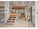 Unfinished stairs with wood and building materials at 4267 Matisse Ln, Fairburn, GA 30213