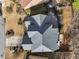 Bird's-eye view of a house with a well-manicured lawn and a gray roof at 2669 Glenrose Hl, Atlanta, GA 30341