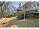 Fenced backyard featuring mature trees and landscaping, ideal for outdoor activities at 2669 Glenrose Hl, Atlanta, GA 30341