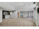 Spacious finished basement with bar and neutral carpet; perfect for entertaining at 2669 Glenrose Hl, Atlanta, GA 30341