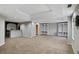 Spacious finished basement with built-in shelving and a wet bar at 2669 Glenrose Hl, Atlanta, GA 30341