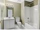 Full bathroom featuring a shower-tub combo and vanity at 2669 Glenrose Hl, Atlanta, GA 30341