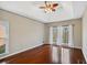 Spacious bedroom with hardwood floors and ceiling fan at 2669 Glenrose Hl, Atlanta, GA 30341