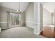 Dining room with a large window overlooking the backyard and decorative trim at 2669 Glenrose Hl, Atlanta, GA 30341
