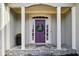 Purple front door with a wreath, flanked by columns at 2669 Glenrose Hl, Atlanta, GA 30341