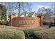 Entrance to the Glenrose neighborhood with decorative brick signage and landscaping at 2669 Glenrose Hl, Atlanta, GA 30341