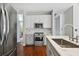 Modern kitchen with stainless steel appliances and marble countertops at 2669 Glenrose Hl, Atlanta, GA 30341