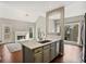Open kitchen featuring marble countertops and stainless steel appliances, flowing into a living area at 2669 Glenrose Hl, Atlanta, GA 30341