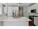 Updated kitchen with stainless steel appliances and marble countertops at 2669 Glenrose Hl, Atlanta, GA 30341