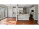View of the kitchen with marble island, stainless steel appliances, and hardwood flooring at 2669 Glenrose Hl, Atlanta, GA 30341
