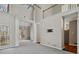 Living Room with soaring ceilings and large windows to outdoor views at 2669 Glenrose Hl, Atlanta, GA 30341