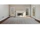 Living room with fireplace and access to the backyard at 2669 Glenrose Hl, Atlanta, GA 30341
