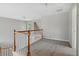 Second-floor loft area with neutral carpet at 2669 Glenrose Hl, Atlanta, GA 30341