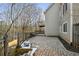 Brick patio with a raised garden bed and wood fence at 2669 Glenrose Hl, Atlanta, GA 30341