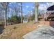 Spacious backyard with deck, shed, and large trees at 3384 Campbell Se Rd, Smyrna, GA 30080