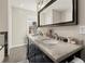 Bathroom boasting double vanity and granite countertop at 3384 Campbell Se Rd, Smyrna, GA 30080