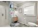 Bathroom with a walk-in shower and modern vanity at 3384 Campbell Se Rd, Smyrna, GA 30080