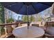 Deck with patio furniture and umbrella at 3384 Campbell Se Rd, Smyrna, GA 30080