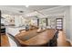 Open concept dining room showcasing a large wooden table at 3384 Campbell Se Rd, Smyrna, GA 30080