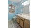 Simple bathroom with vanity and a window at 4745 Elam Forest Dr, Stone Mountain, GA 30083