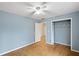 Bedroom with closet and access to hallway at 4745 Elam Forest Dr, Stone Mountain, GA 30083