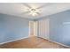 Bedroom with large closet and new flooring at 4745 Elam Forest Dr, Stone Mountain, GA 30083