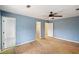 Bedroom with access to bathroom and closet at 4745 Elam Forest Dr, Stone Mountain, GA 30083