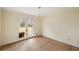 Empty dining room with hardwood floors and sliding glass doors leading to a deck at 4745 Elam Forest Dr, Stone Mountain, GA 30083