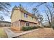 Side view of a two-story house with walkway at 4745 Elam Forest Dr, Stone Mountain, GA 30083