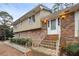 Front entrance of a two-story house with stairs at 4745 Elam Forest Dr, Stone Mountain, GA 30083