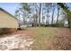 Side view of house with deck and large yard at 4745 Elam Forest Dr, Stone Mountain, GA 30083