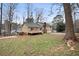 Side view of house with deck and fenced yard at 4745 Elam Forest Dr, Stone Mountain, GA 30083