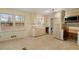 Kitchen with light wood cabinets and a view of the backyard at 4745 Elam Forest Dr, Stone Mountain, GA 30083