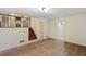 Living room with hardwood floors and a view of the staircase at 4745 Elam Forest Dr, Stone Mountain, GA 30083