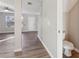 Convenient half bathroom with single vanity and toilet at 6897 Estepona St, Atlanta, GA 30349