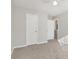 Bright bedroom with neutral walls and carpet at 6897 Estepona St, Atlanta, GA 30349