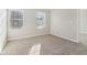 Spacious bedroom with neutral walls and carpet flooring at 6897 Estepona St, Atlanta, GA 30349