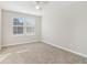 Spacious bedroom with ceiling fan and neutral decor at 6897 Estepona St, Atlanta, GA 30349