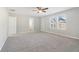 Spacious bedroom with plush carpeting and ample natural light at 6897 Estepona St, Atlanta, GA 30349