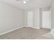 Spacious bedroom with neutral walls and carpet at 6897 Estepona St, Atlanta, GA 30349