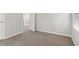 Spacious bedroom with neutral walls and carpet at 6897 Estepona St, Atlanta, GA 30349