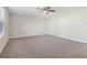 Spacious bedroom with carpet, window and ceiling fan at 6897 Estepona St, Atlanta, GA 30349