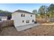 Rear view of house showing two-story home and backyard at 6897 Estepona St, Atlanta, GA 30349