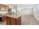 Kitchen with island, stainless steel appliances, and wood cabinets at 6897 Estepona St, Atlanta, GA 30349