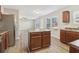 Spacious kitchen with island, stainless steel appliances, and ample cabinet space at 6897 Estepona St, Atlanta, GA 30349