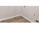 Laundry area with vinyl flooring and hookups for washer and dryer at 6897 Estepona St, Atlanta, GA 30349