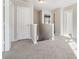 Upstairs hallway with access to bedrooms and stairs at 6897 Estepona St, Atlanta, GA 30349